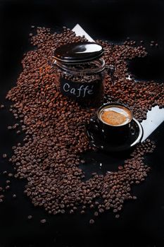 Coffee and coffee beans ona studio background