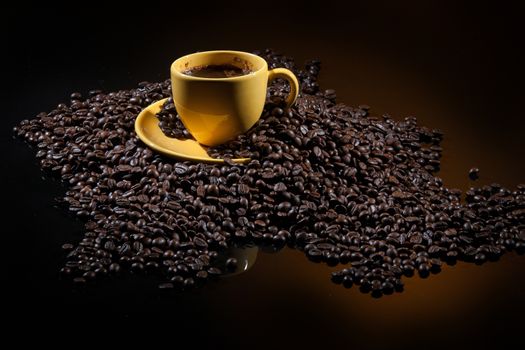 Coffee and coffee beans ona studio background