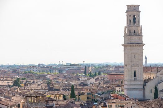 Verona, Veneto/Italy - 18.08.2020: View of Verona from above to the old town with a church tower in the foreground.