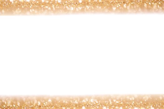 Shiny golden bokeh glitter abstract lights isolated on white background, Christmas New Year party celebration concept