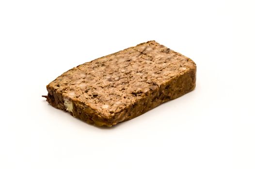 Slice of country pate on a white background