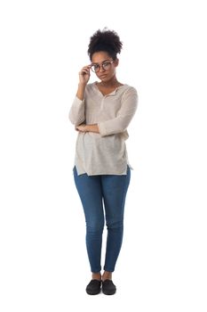 Full length portrait of african american mixed race woman touching glasses isolated on white background, casual people