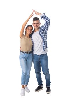 Young happy couple with roof house hand gesture isolated on white background, casual people