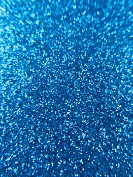 Navy blue abstract glitter vertical texture background.