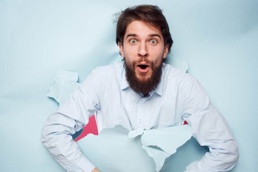 Cheerful man in shirt lifestyle cropped view of work office. High quality photo