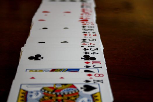 Straight row of playing cards