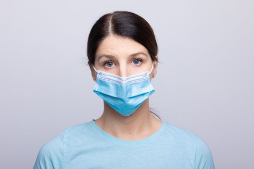Worried nurse, doctor or scientist portrait behind face mask and protective facemask stock photo