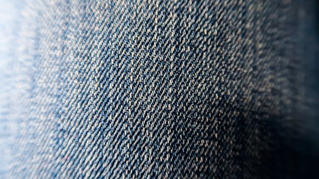 Close up of jeans material. Jeans texture background. Blue jeans texture. Denim jeans texture.