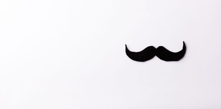 Black mustache, studio shot isolated on white background, Prostate cancer awareness month, Fathers day, minimal November moustache concept