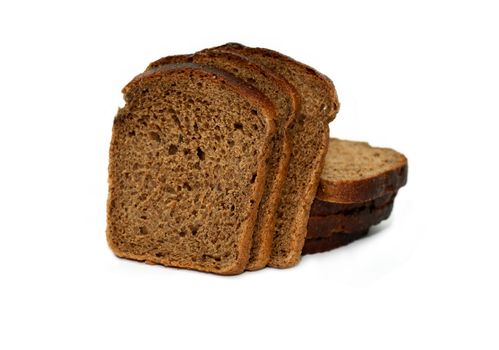 Few slices of rye bread on white background