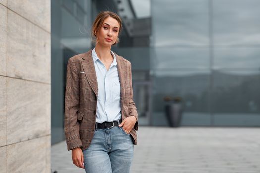 Businesswoman successful woman business person standing outdoor corporate building exterior Pensive elegance cute caucasian confidence professional business woman middle age female Bank worker