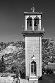 Orthodox church belfry on the island of Kefalonia in Greece, monochrome
