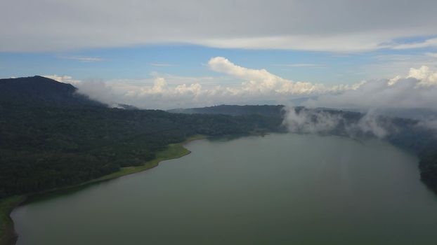 Aerial view of a beautiful lake inside an old volcanic caldera. Lake Buyan, Twin Lakes, Bali, Indonesia.