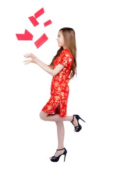 Beautiful portrait young asian woman cheongsam dress smiling receive or throw red envelope on white background, beauty girl wear qipao celebrate with exciting, happy Chinese New Year, holiday concept.
