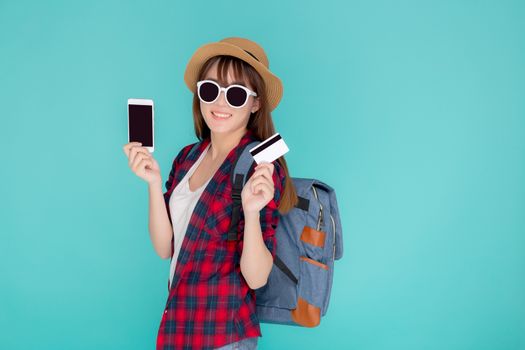 Beautiful portrait young asian woman wear travel summer fashion holding credit card and smart mobile phone in summer, asia girl payment for booking internet online with app in vacation.