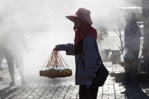 Pha Soet Hot Spring Chiang Rai Thailand 12.10.2015 egg sellers for boiling in hot spring water at coffee stop for tourists . High quality photo