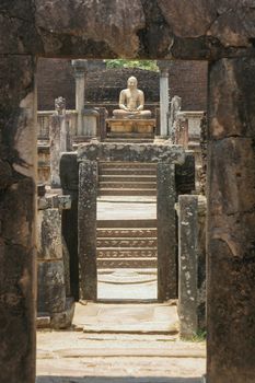 Polonnaruwa Sri Lanka Ancient ruins. Statues including Buddha stupa carvings . High quality photo