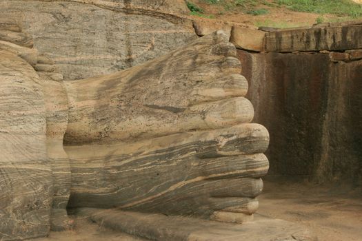 Polonnaruwa Sri Lanka Ancient ruins Statue of reclining Buddha laying down . High quality photo