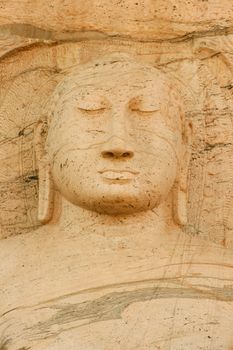 Polonnaruwa Sri Lanka Ancient ruins. Statue including Buddha with peaceful serene face . High quality photo