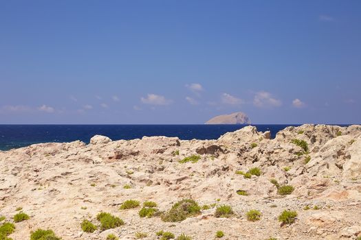 GRAMVOUSA - BALOS, THE CRETE ISLAND, GREECE - JUNE 4, 2019: Beautiful seaview at the beach of the pirate island of Gramvousa. The island is famous for its pirate castle on the top of the mountain.