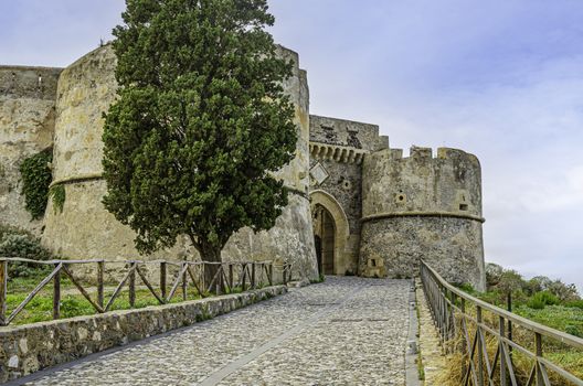 facade and entrance to the medieval castle of milazzo in sicily on the tyrrhenian sea. Italy.