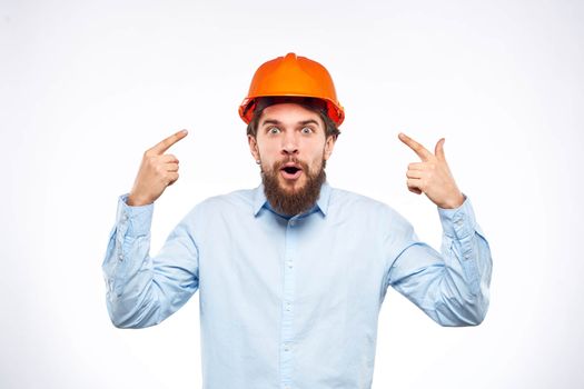 emotional men orange helmet engineer construction industry lifestyle cropped view. High quality photo