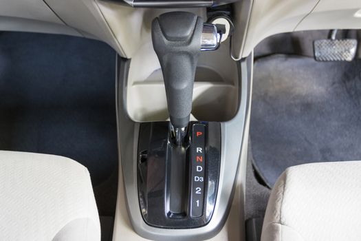 Close up the symbol of each auto gear for car shifting into P will try to engage the parking pawl to prevent the transmission