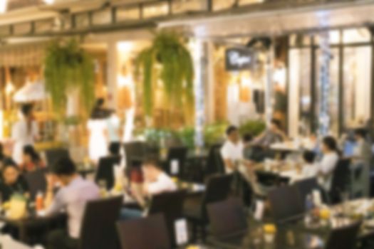 blurred image Lots of people enjoy at the bar pub fun of night festival in a restaurant and The atmosphere is party happy and relaxing.