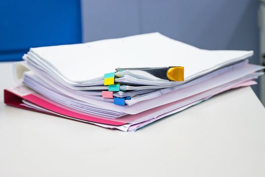 file folder and Stack of business report paper file on the table in a work office, concept document in work office