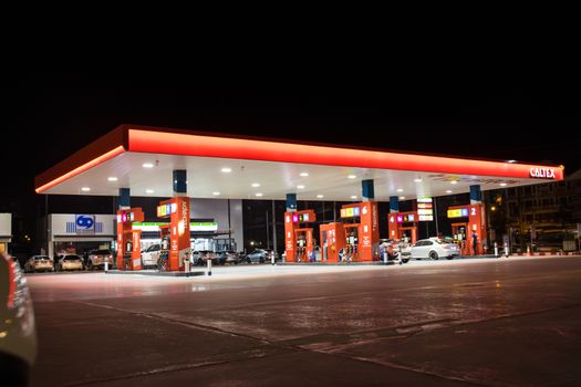 BANGKOK THAILAND :- NOv 23,  2020 : CALTEX OIL Station, Fueling stations Refuel service for Cars are refueling at the gas station Thailand. Ready to service 24 hour.