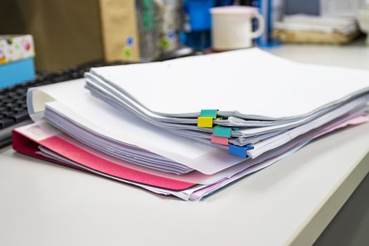 file folder and Stack of business report paper file on the table in a work office, concept document in work office