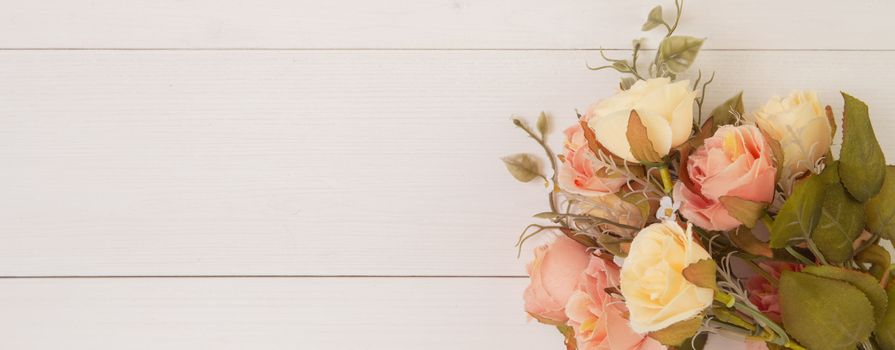 Beautiful flower on wooden background with romantic, mother day or valentine day, spring or summer nature background for decoration, bouquet floral for gift on desk, holiday concept, banner website.