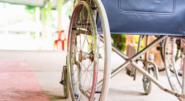 Closeuo empty wheelchairs in the hospital parked waiting for physical patient services, medical care concept