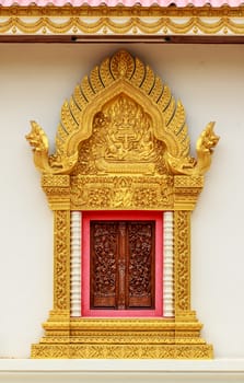 Thai style golden carving wooden window