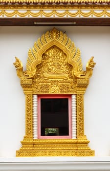 Thai style golden carving wooden window