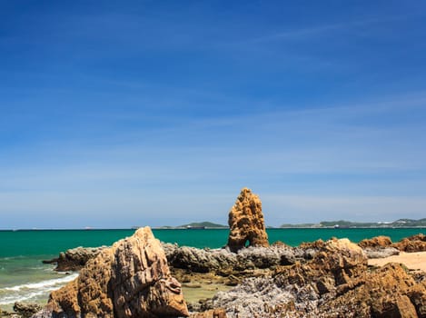 Beautiful sea and rocks daytime.