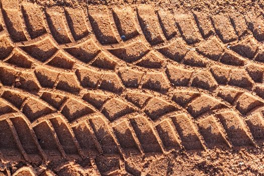 Tire track on muddy road