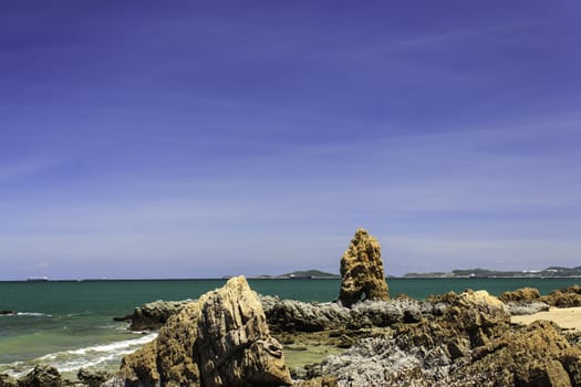 Beautiful sea and rocks daytime.