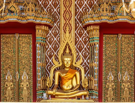 Gold buddha statue in thai temple, Thailand .