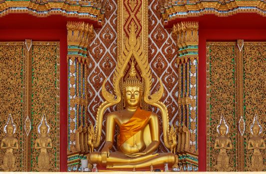 Gold buddha statue in thai temple, Thailand .