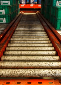 package boxes on industrial conveyor line.