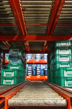 package boxes on industrial conveyor line.