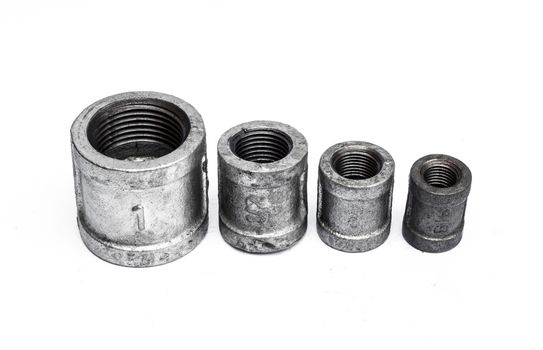 various metal fittings inner, for pipes on white