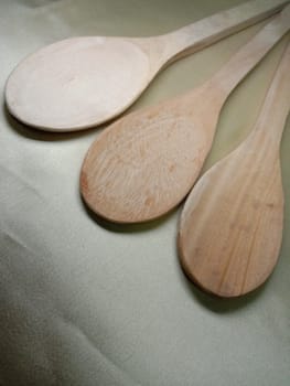 wooden spoon closeup on white background