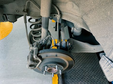 disc brake and suspension system of a car to be fixed at garage