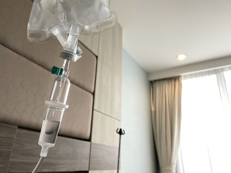 saline solution drip for treatment patient in hospital, sodium chloride solution for intravenous, shallow depth of field