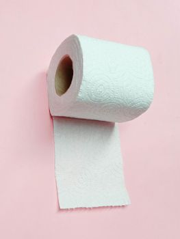 toilet paper tissue closeup on pink background