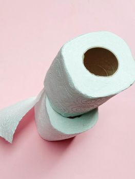 toilet paper tissue closeup on pink background