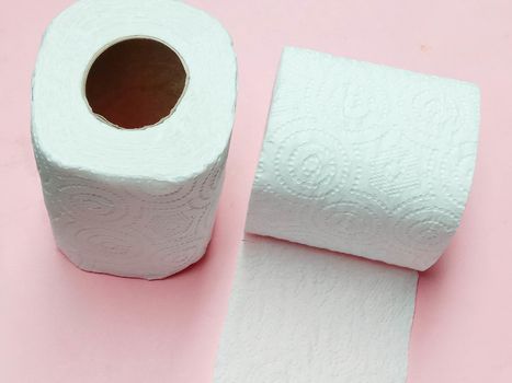 toilet paper tissue closeup on pink background
