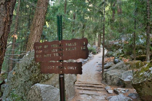 Yosemite, USA, November 2013: hiking trail and sign to Vernal and Nevada falls in yosimete national park